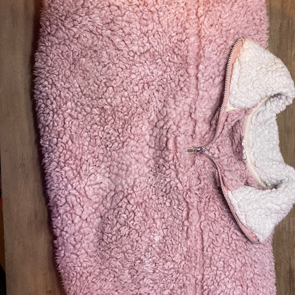 Pink and white fluffy half zip sweater.